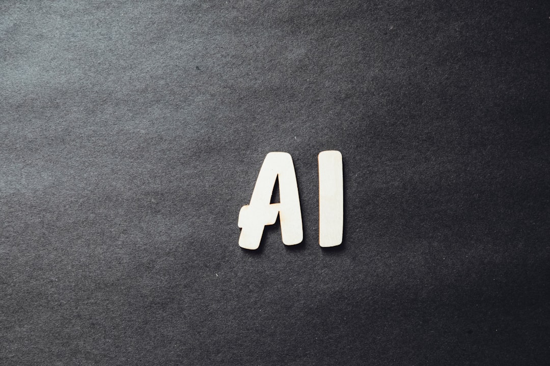 The word ai spelled in white letters on a black surface