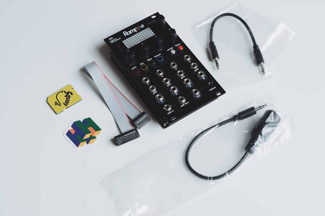 Black electronic device with cables and accessories