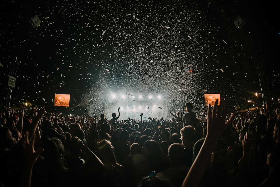 People gathering on concert field