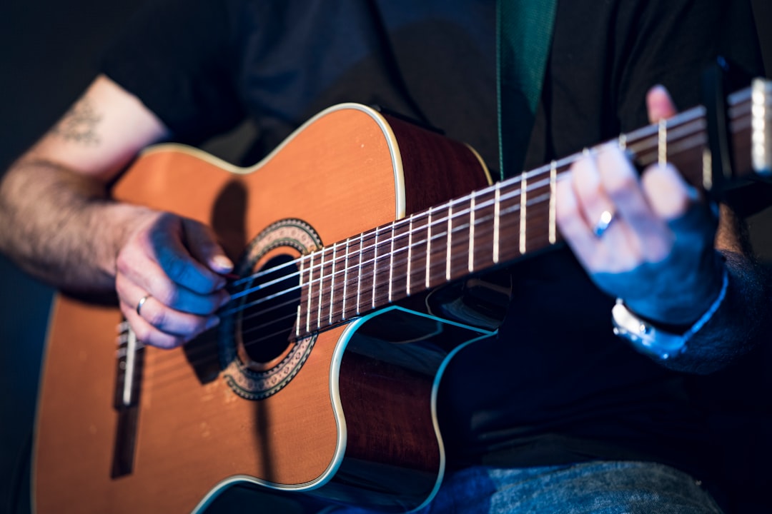 Person playing guitar