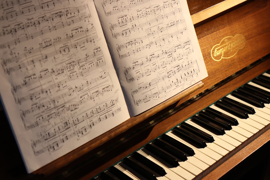 Music note on brown piano