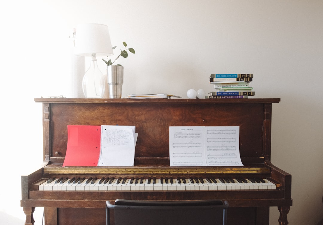 Brown wooden spinet piano