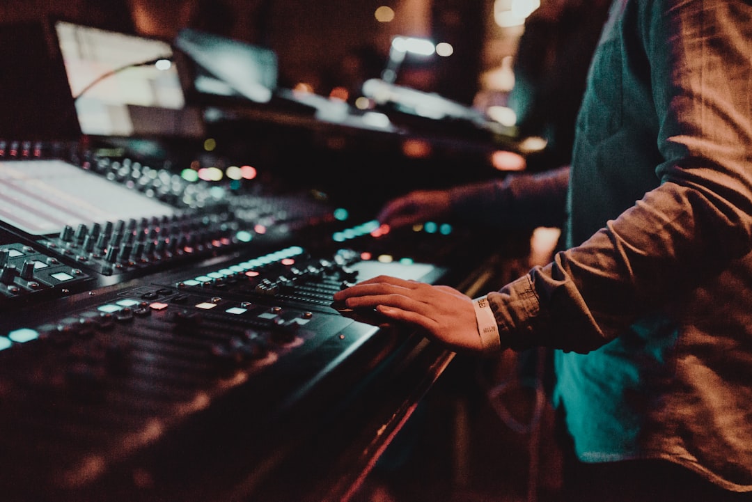 Person on black audio equalizer