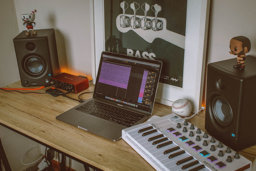 A laptop sits on a desk