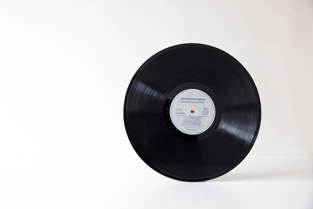 A black circular object with a white label on it