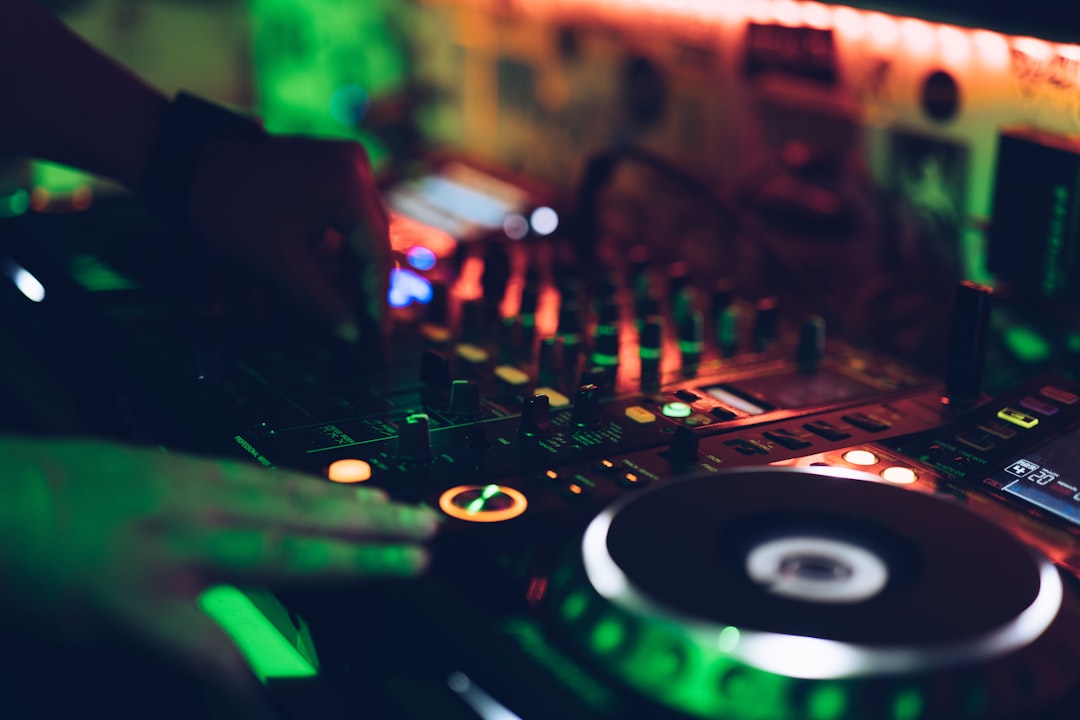 Person using DJ mixer