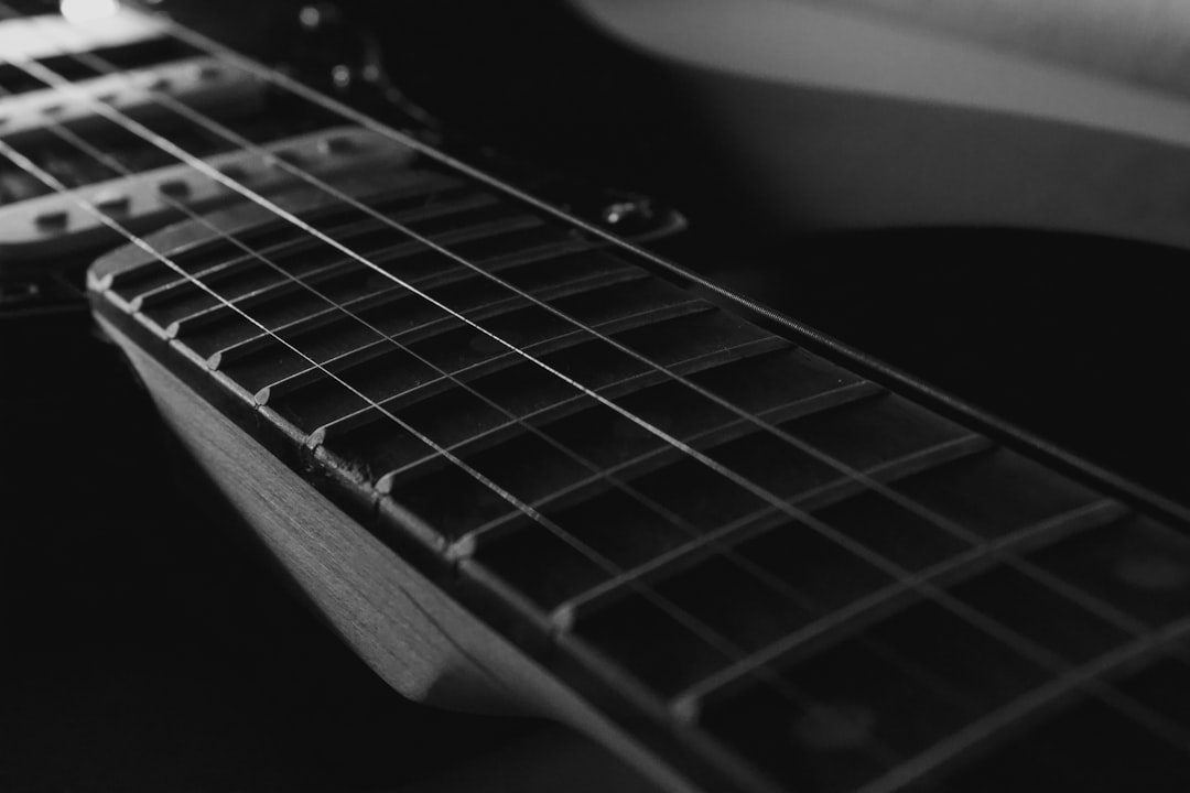 Close-up of an electric guitar fretboard