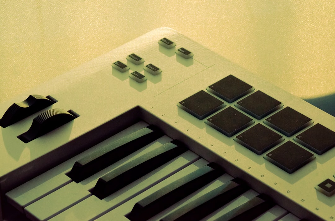 A computer keyboard with a lot of chocolate pieces on top of it
