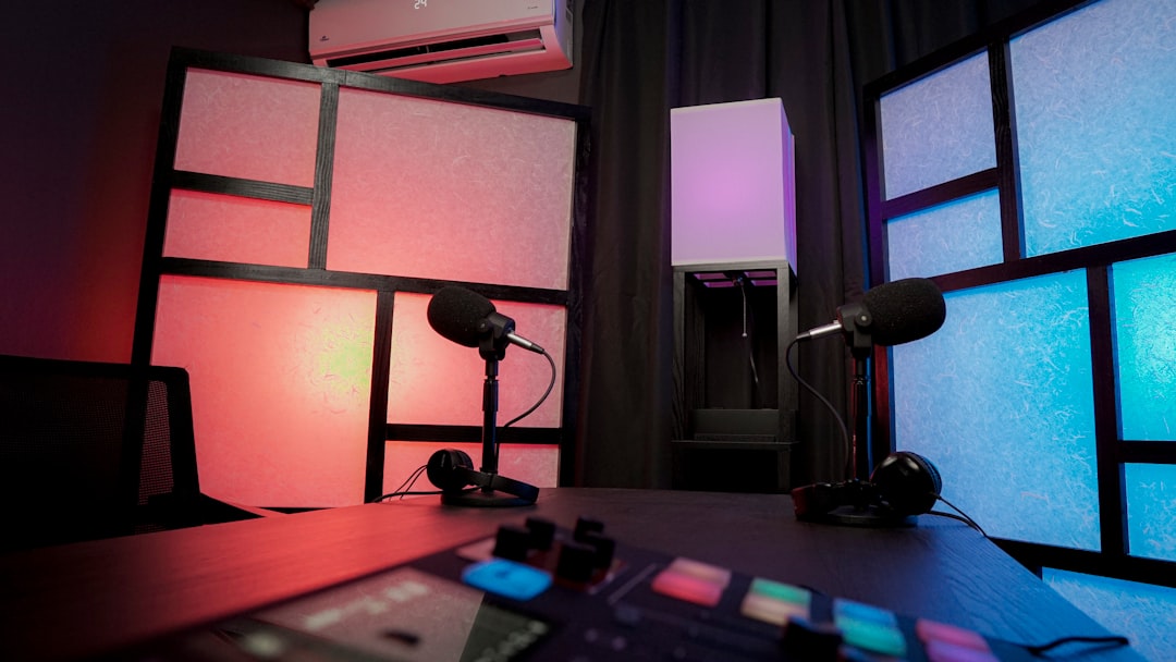 A desk with a lamp and a window