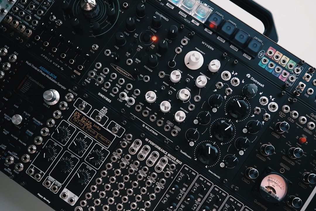 Close-up of a complex electronic music synthesizer panel.