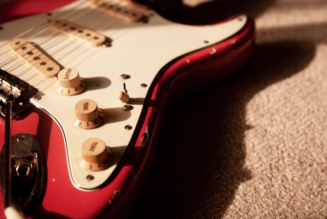 White and red electric guitar