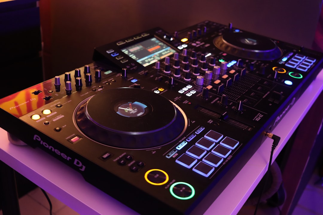 A dj controller sitting on top of a table