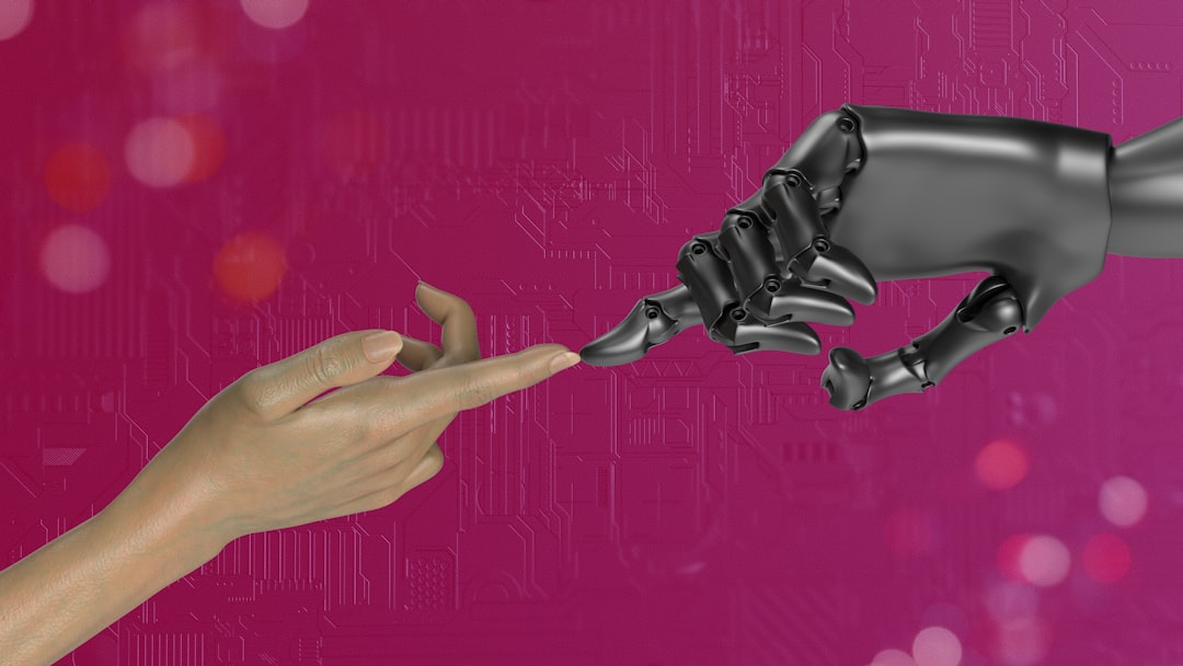 Two hands touching each other in front of a pink background