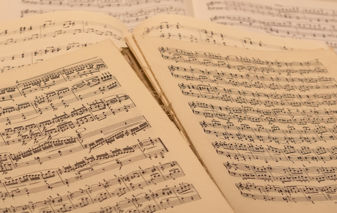 An open book with sheet music on it