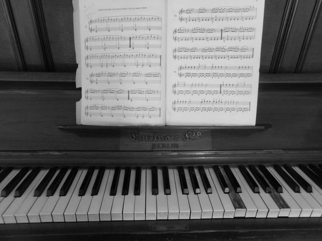 Gray wooden upright piano